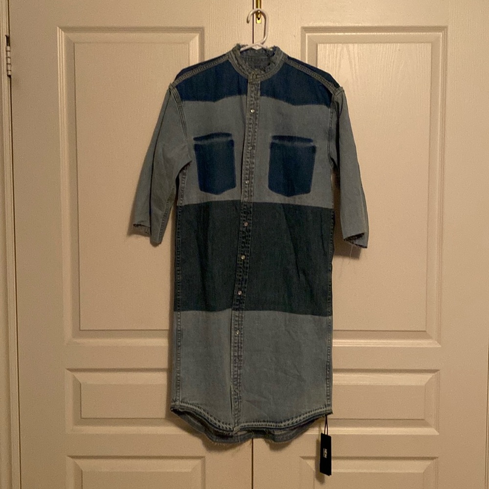 Oversized denim dress. Two tone colour. Can be worn open as an over shirt.